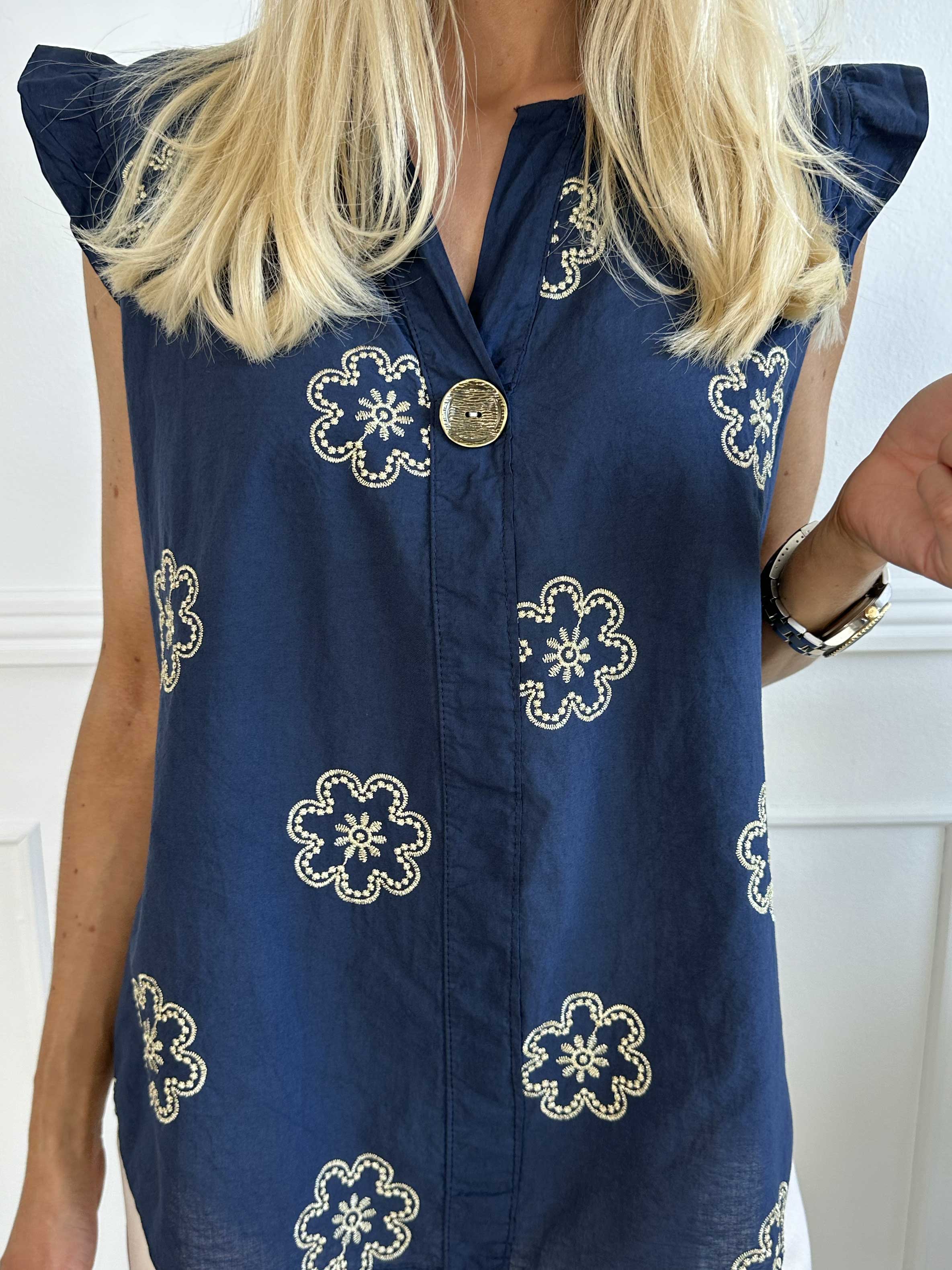 Kreta - Söt tunika i bomull med blommor och volangärmar